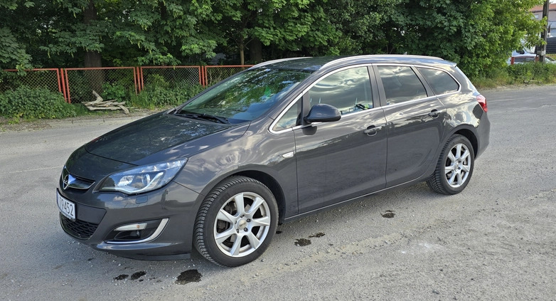 Opel Astra cena 25500 przebieg: 239000, rok produkcji 2014 z Poznań małe 277